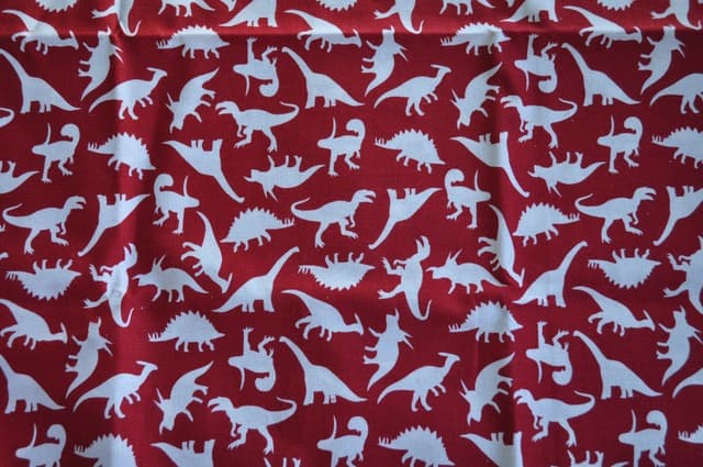 White Dinosaurs On Red